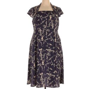 Short sleeve, square, a-line silhouette, dark blue dress with beige print design